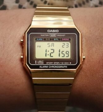 A-person-wearing-a-gold watch